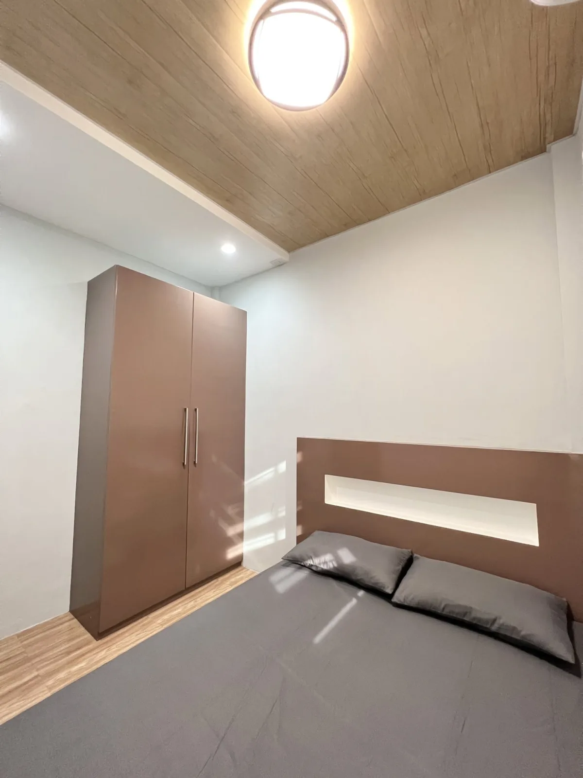 Bedroom with grey bedding